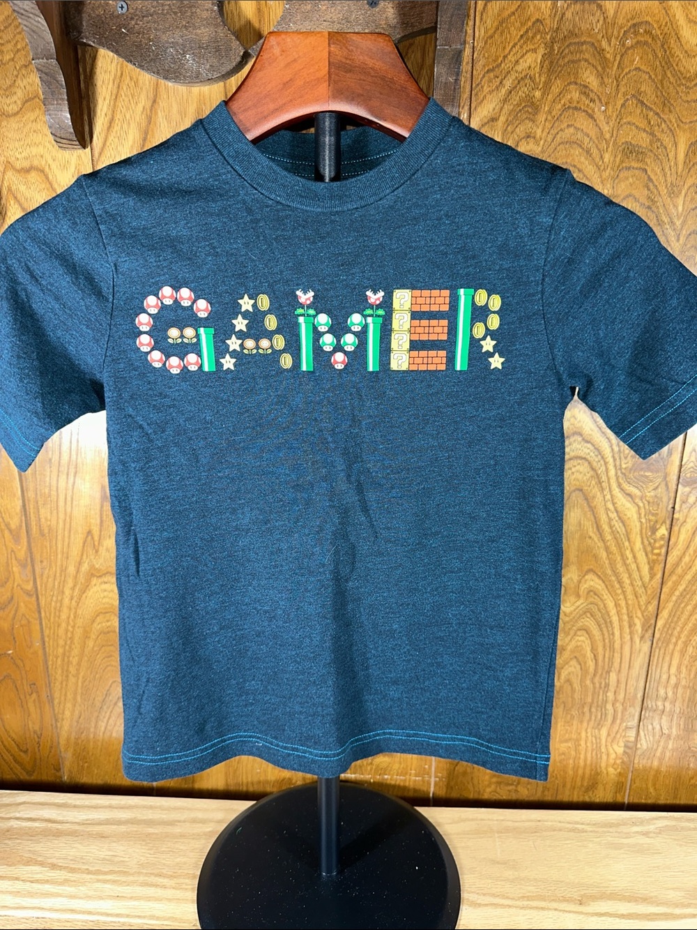 🎉 Nintendo Graphic Tee with Colorful Game Piece Logo. D335